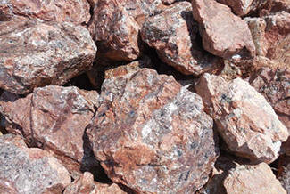 thumbnail image 2 of Rough Feldspar Stones - 1/2 Pound Collection In Velvet Bag 2 of 3